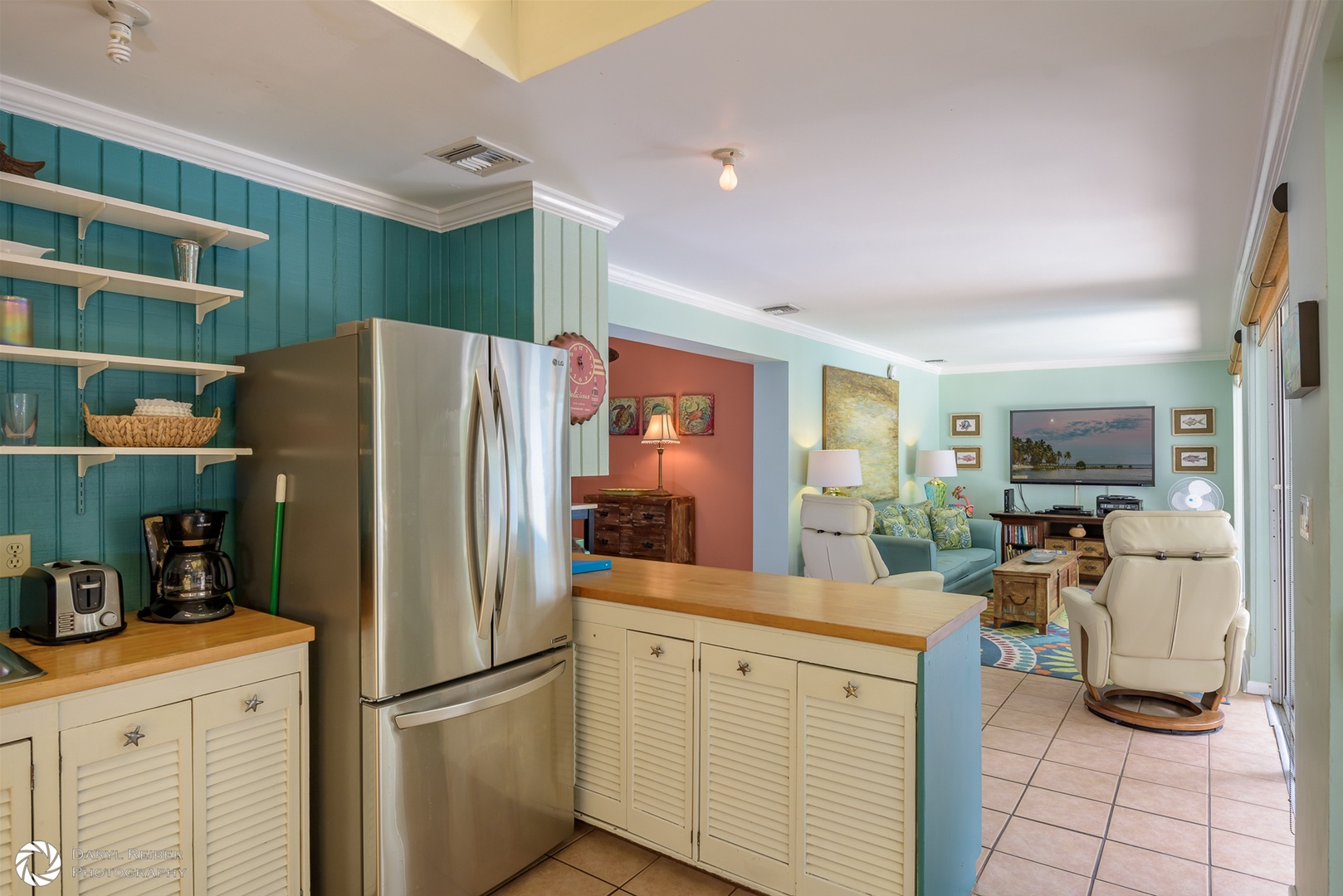 Full Kitchen and Breakfast Bar with view into Living Room