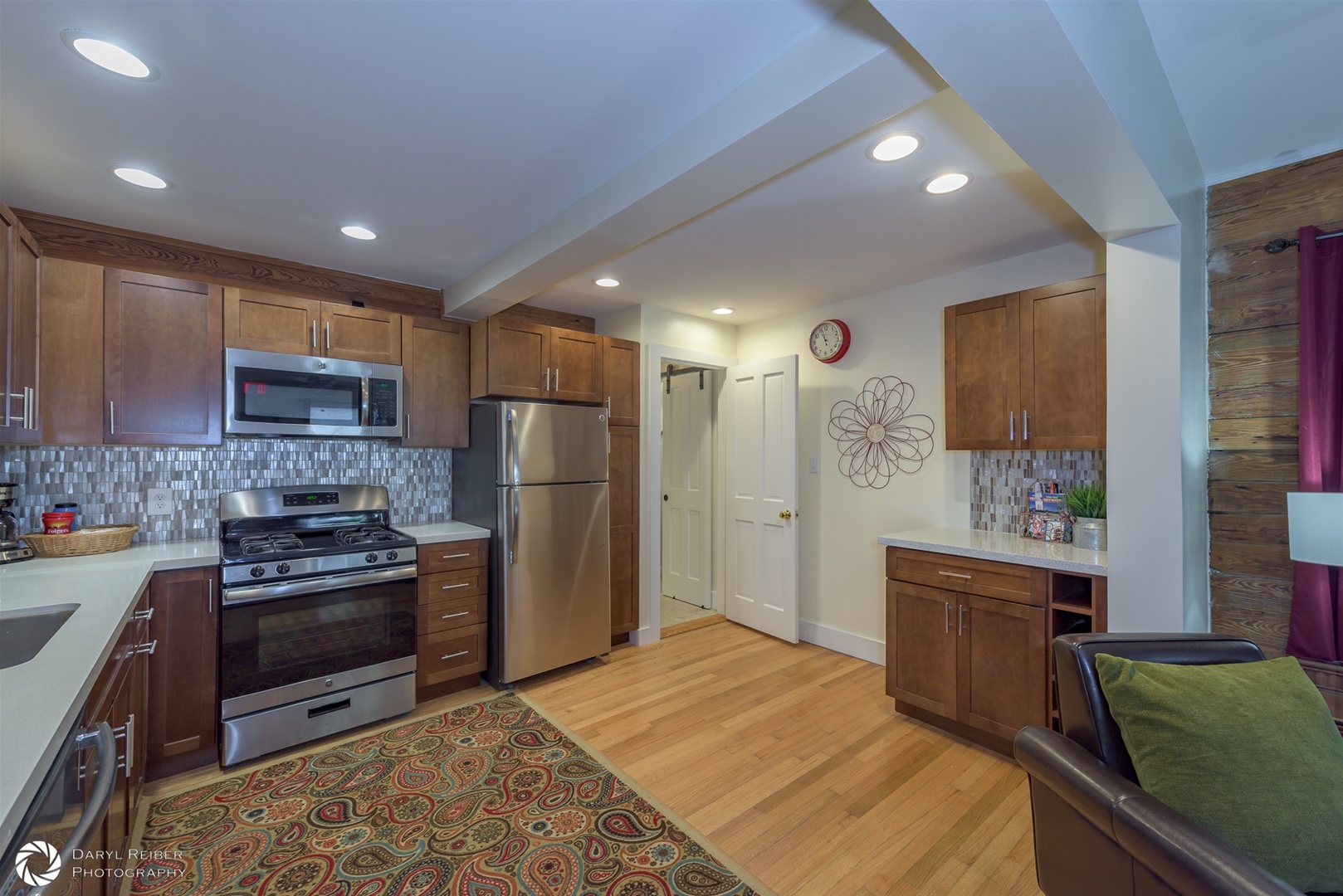 Full Kitchen, Side Nook and door to Half Bathroom and 2nd Bedroom