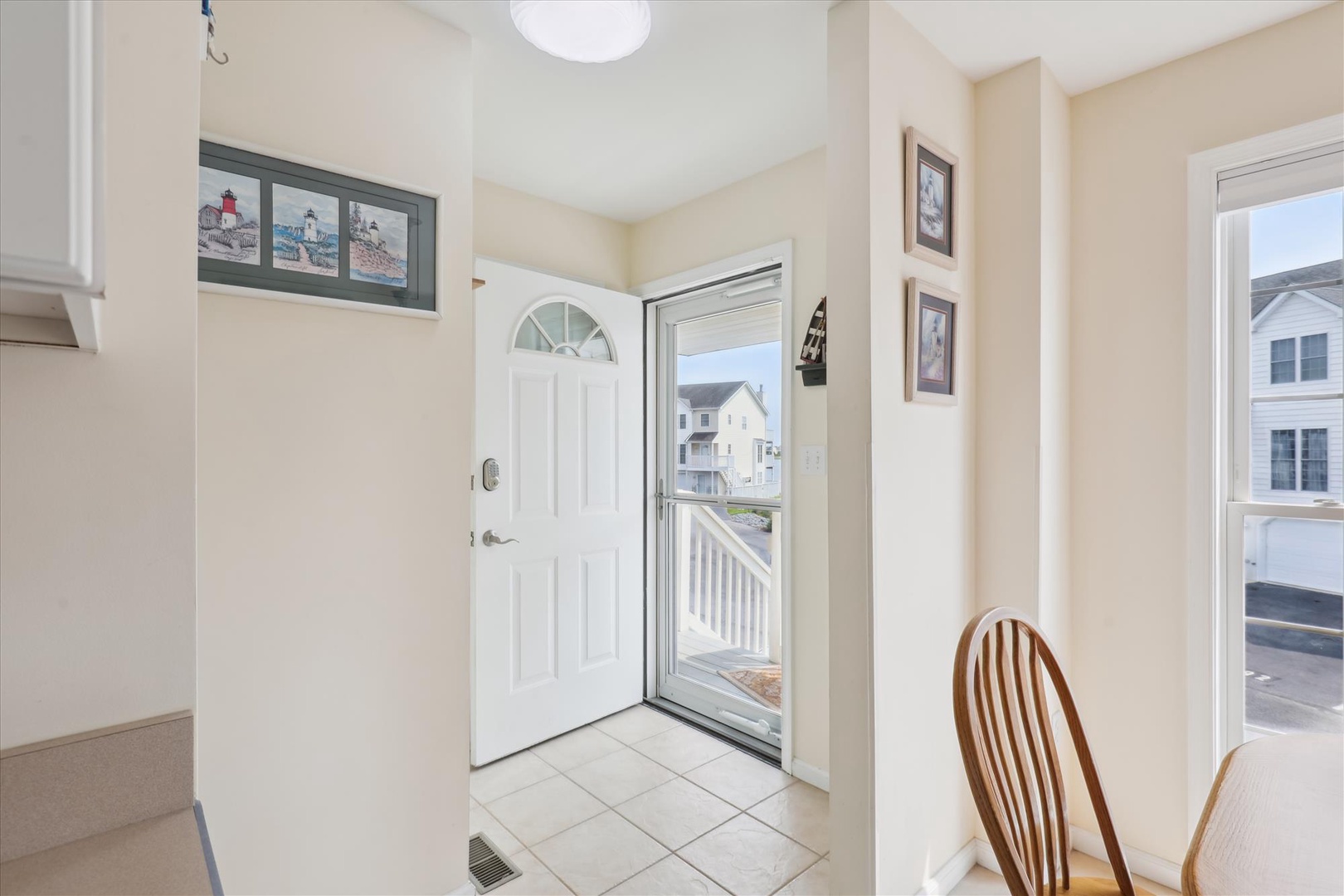 Step into a bright, welcoming entry where coastal charm meets comfort—open the door to your beach getaway and feel instantly at home.