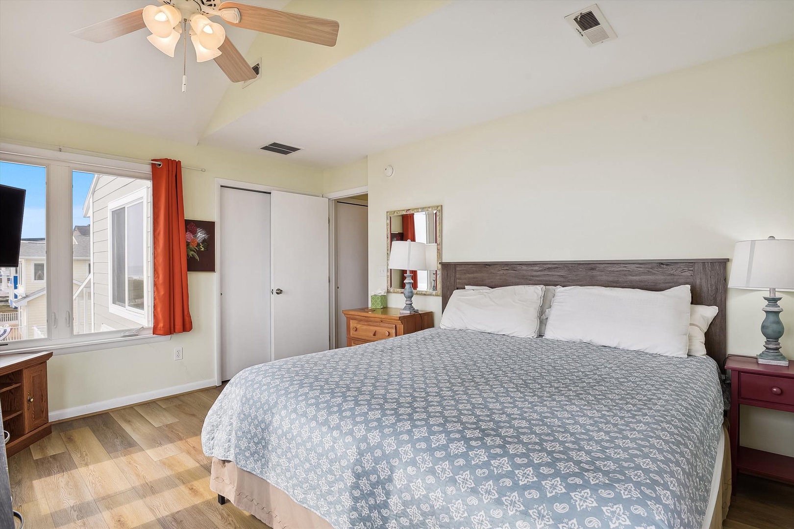 Step into your serene coastal retreat with a plush bed dressed in soft linens, warm natural light, and calming coastal tones that invite you to unwind after a day of seaside adventures.