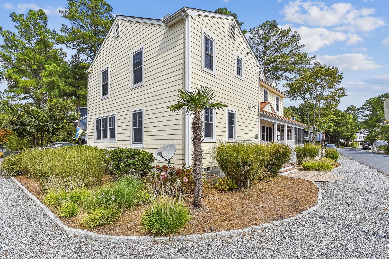 Charming coastal home with fresh exterior and thoughtfully landscaped grounds, nestled in a peaceful residential setting just minutes from local attractions.