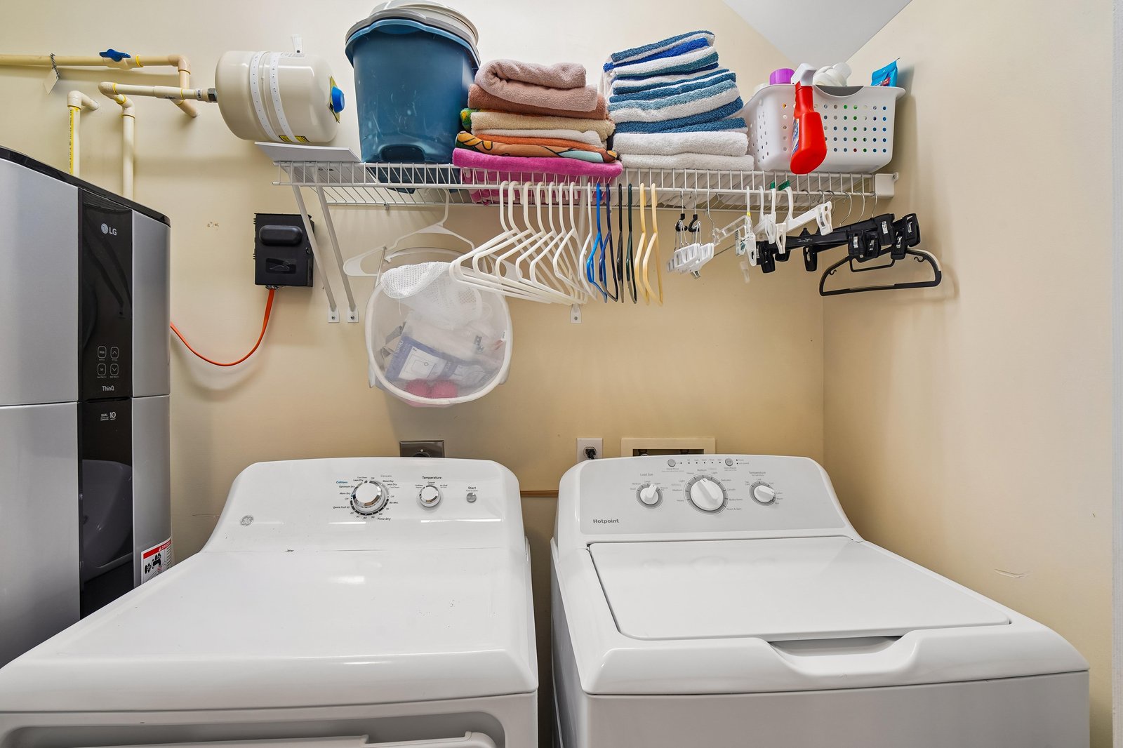 Your own full-size washer and dryer make it easy to pack light and keep your clothes fresh throughout your stay, with handy storage shelves above.