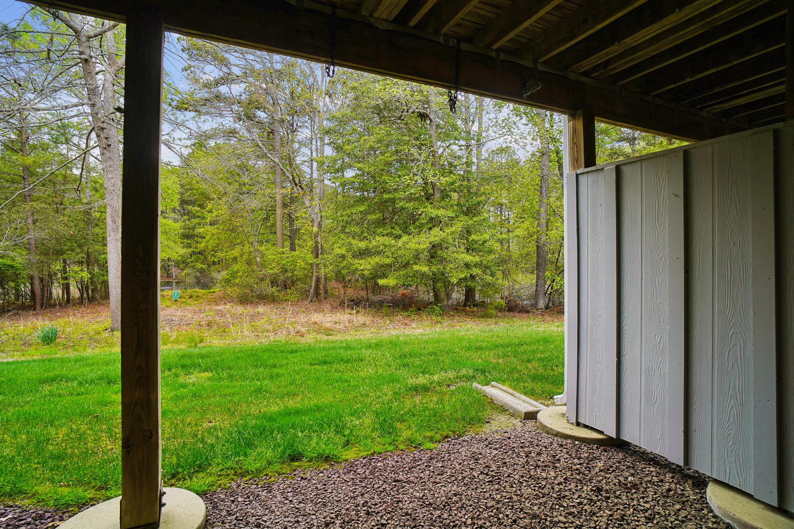 A peaceful property nestled among lush woodlands, offering serene natural surroundings and a sense of secluded escape from everyday life.