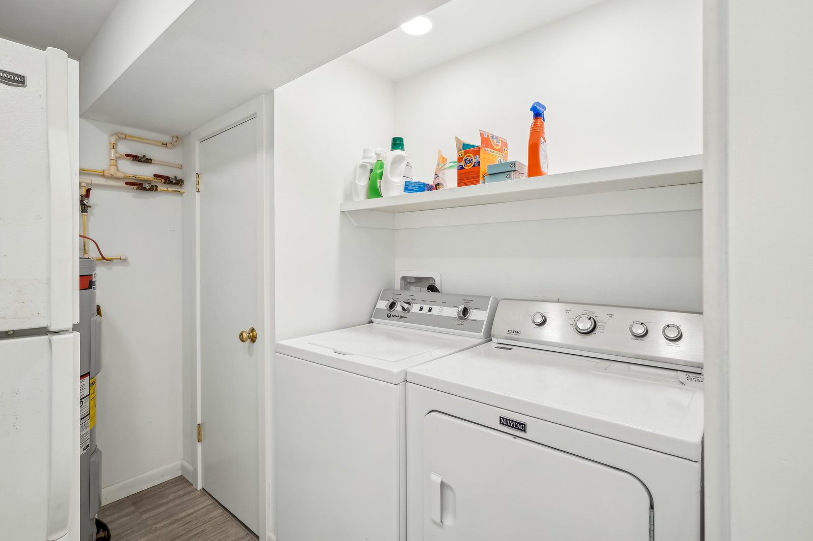 Your laundry needs are covered with a full-size washer and dryer tucked neatly in their own dedicated space.