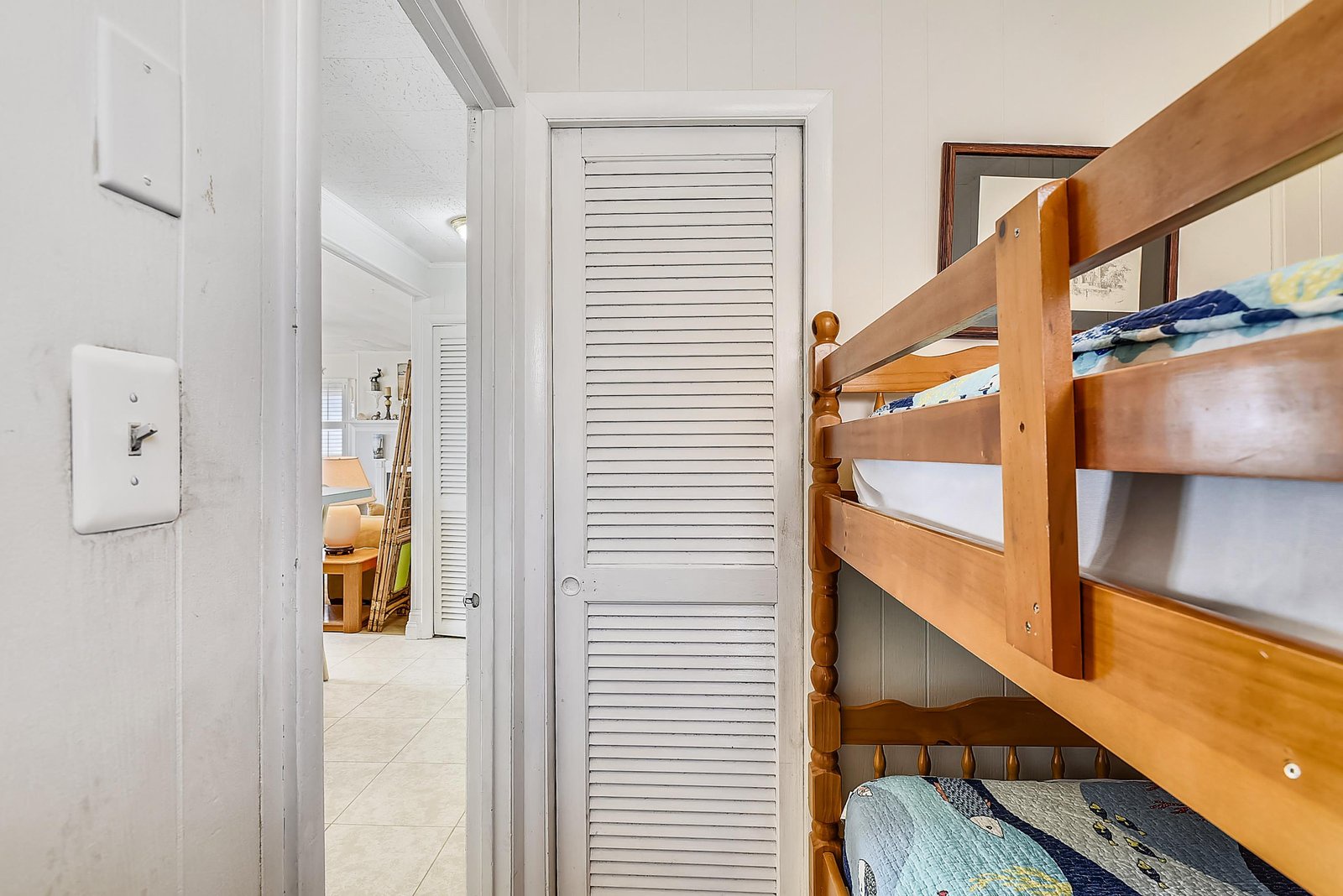 Your coastal cottage includes a tidy bunk room where the kids can settle in after days of beach adventures, with cheerful linens and plenty of space to stash sandy sandals.
