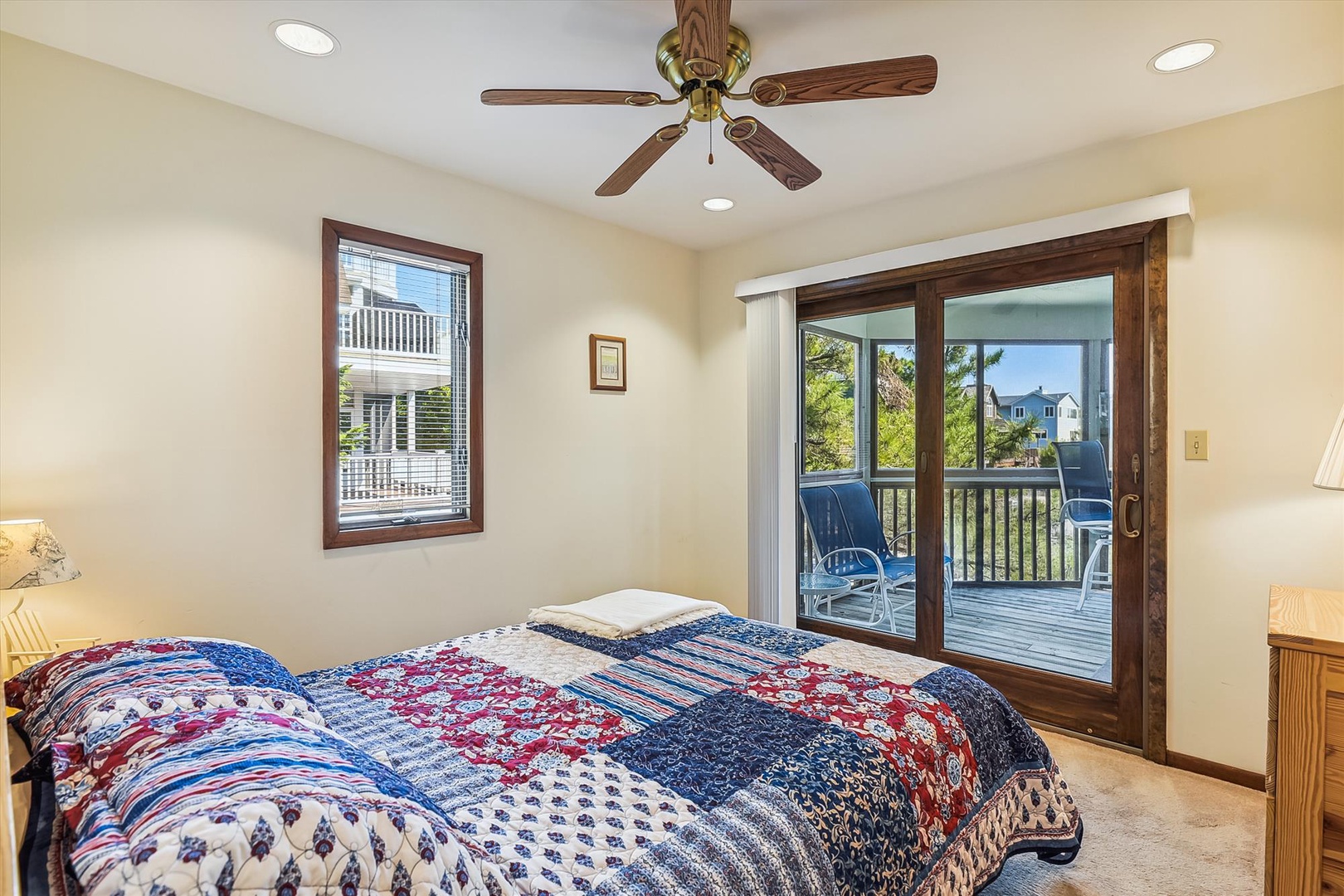 Wake up to sunshine streaming through your private balcony doors, where morning coffee feels like a mini-vacation with lush greenery and coastal charm just steps away.