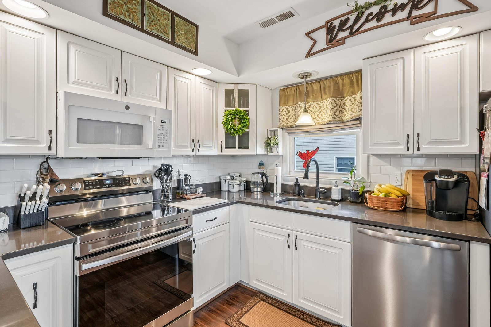 Step into your fully equipped kitchen with stainless steel appliances, custom cabinetry, and ample counter space—everything you need to prepare delicious meals in a bright, welcoming environment.