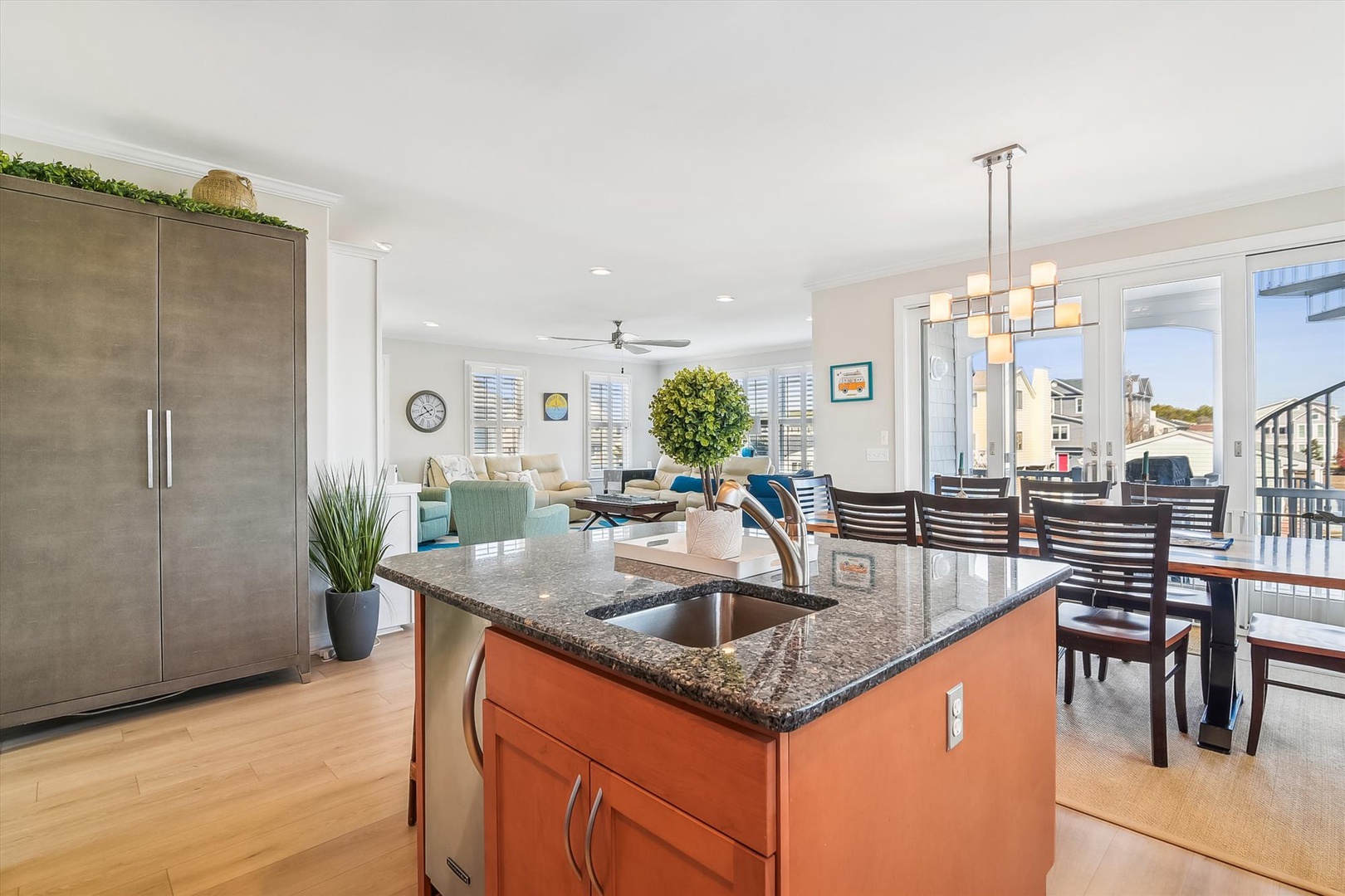 Your spacious open-plan kitchen flows seamlessly into the living and dining areas, creating the perfect space for cooking and entertaining together.