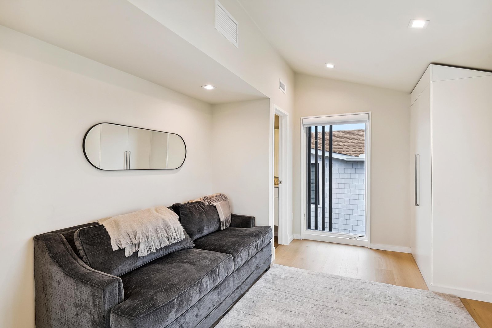 Step into your bright, modern living space with cozy seating and thoughtful climate control—perfect for relaxing after a day of exploring.