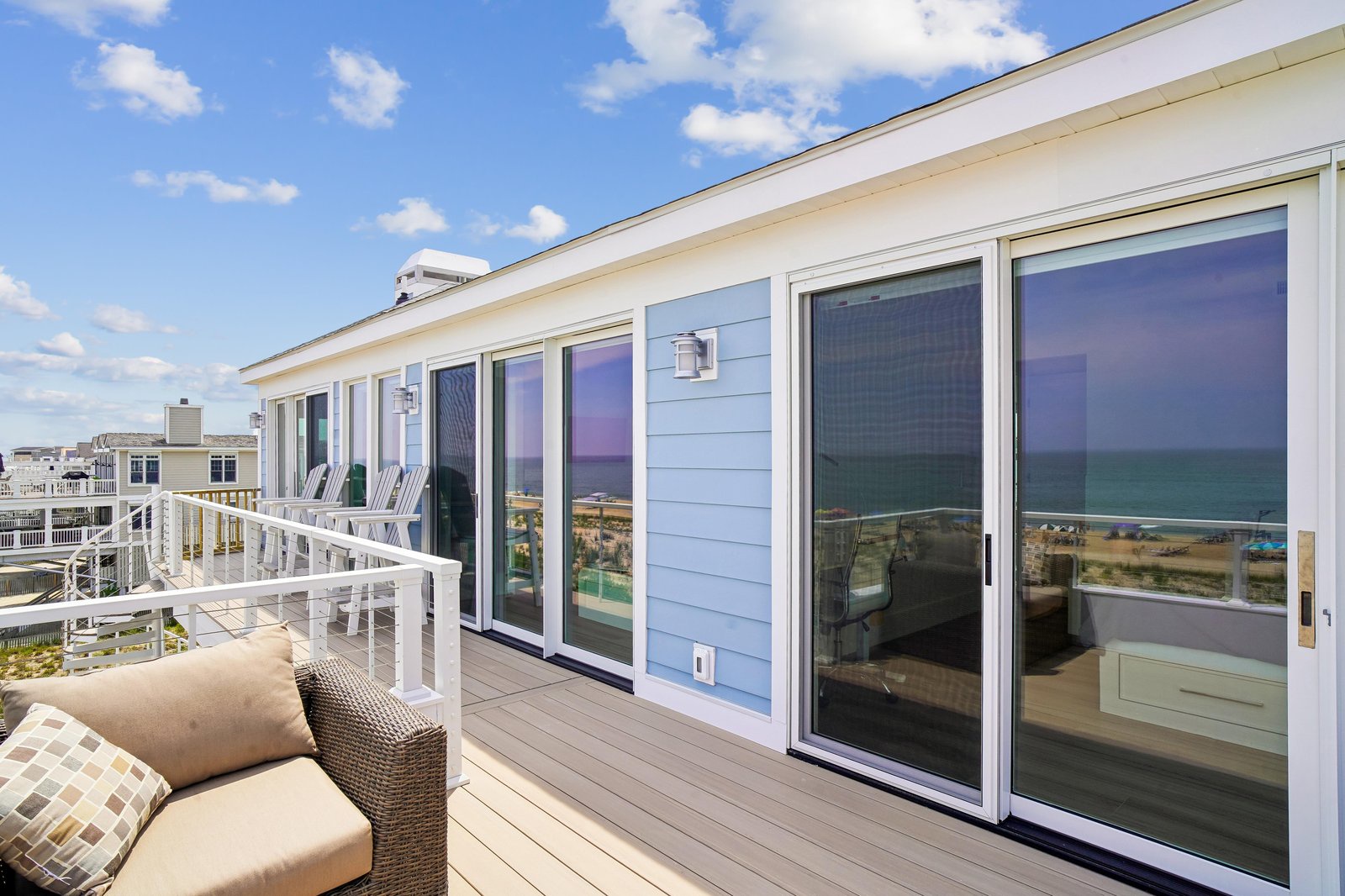 Your private deck offers a front-row seat to stunning ocean vistas and endless blue skies, with cozy seating to soak it all in.