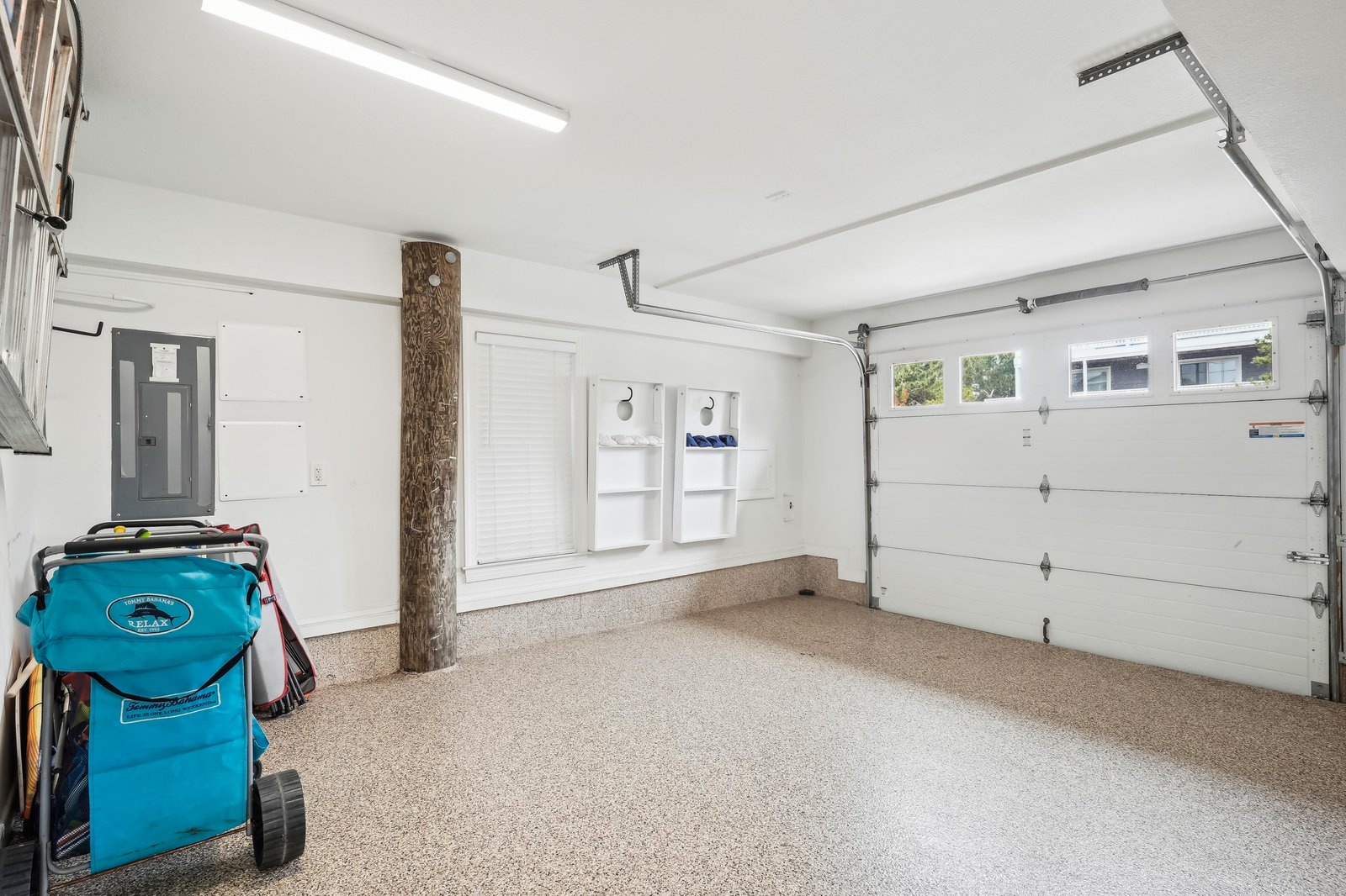 Clean, spacious garage with automatic door opener and plenty of room for your vehicle and gear during your stay.