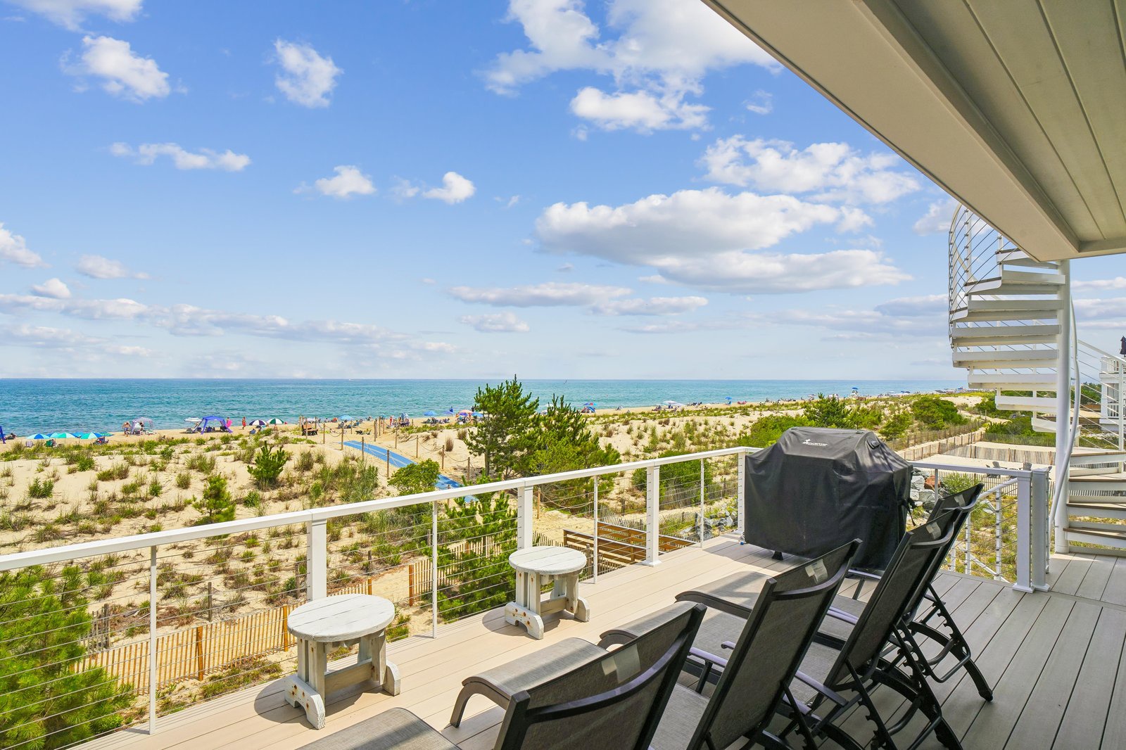 Step onto your private balcony for stunning ocean and beach views. Grill up a meal while breathing in the salty sea air and watching the waves roll in.