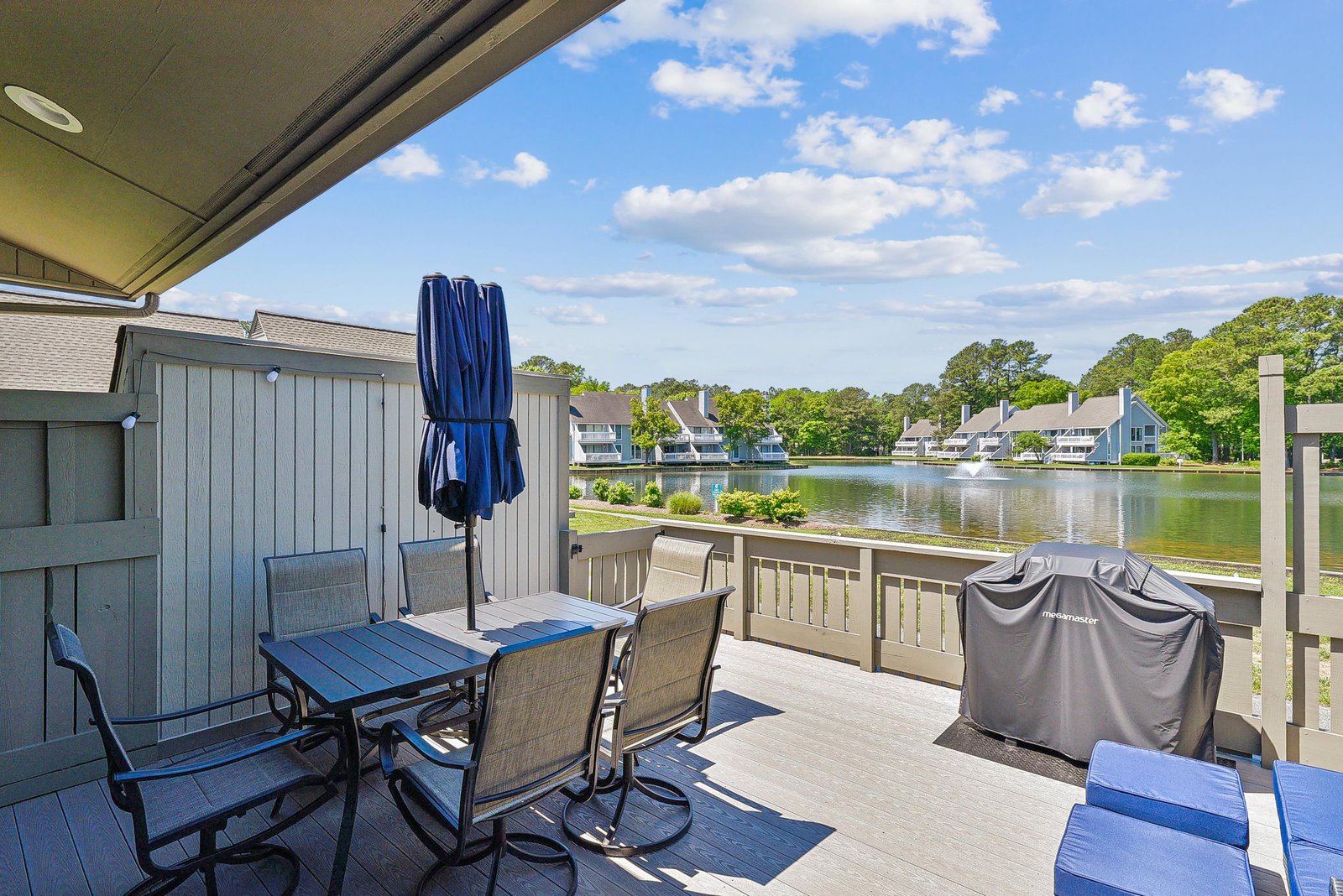 Step onto your private balcony and take in the peaceful lake views. Dine al fresco at the outdoor table, fire up the grill for a cookout, or simply relax and watch the water shimmer under sunny skies.