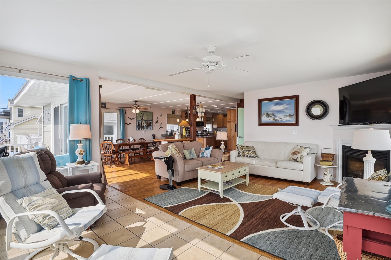 Spread out in this bright, open-plan space where your group can gather on plush seating, enjoy the fireplace's warmth, and relax together in coastal comfort.