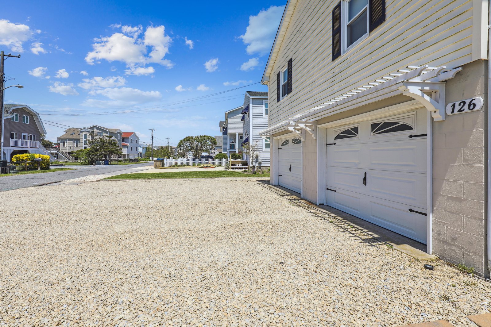 Property 126 features convenient off-street parking on a quiet residential street, with easy access to nearby neighborhoods and coastal attractions.