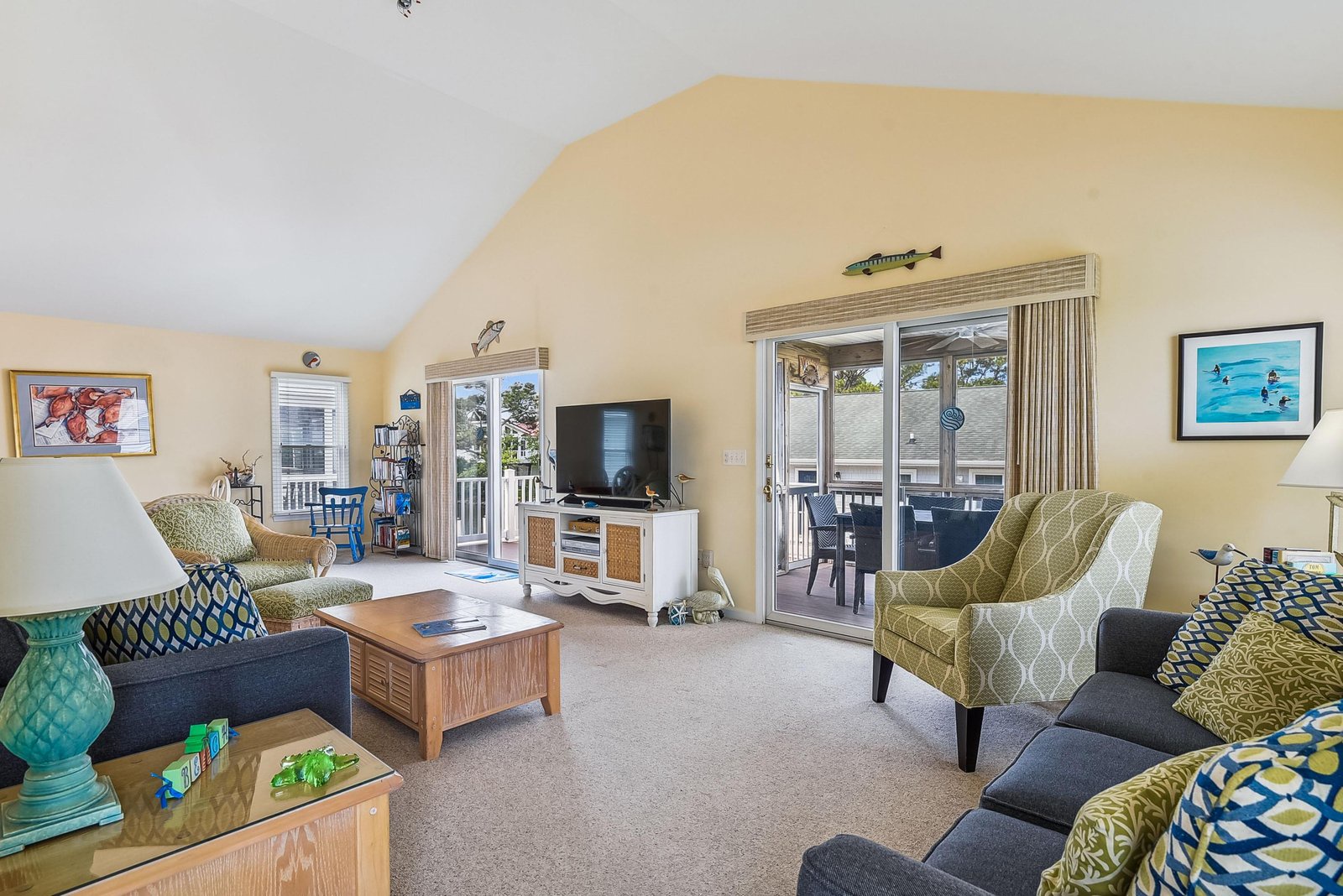Your bright and airy living space opens to a private balcony where you can unwind in comfort. Nautical touches and coastal accents create a relaxed, beachy vibe perfect for your getaway.