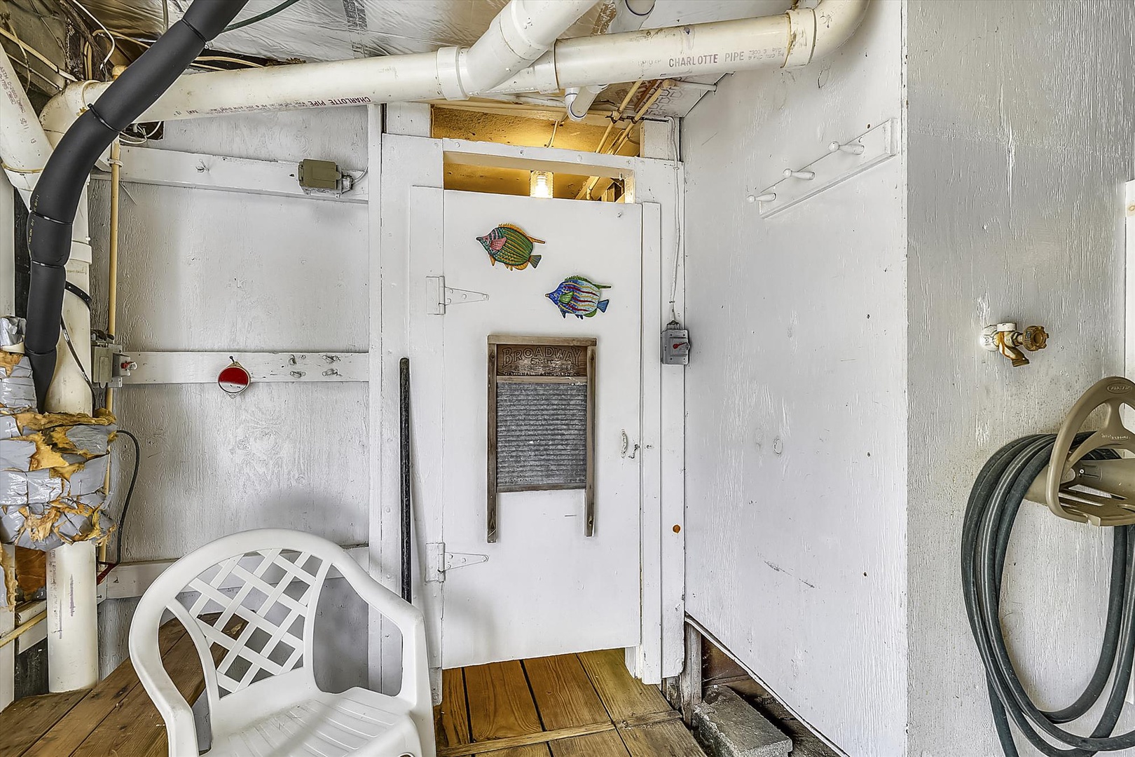 This unique utility space features charming nautical details and exposed character that adds personality to your rental experience.