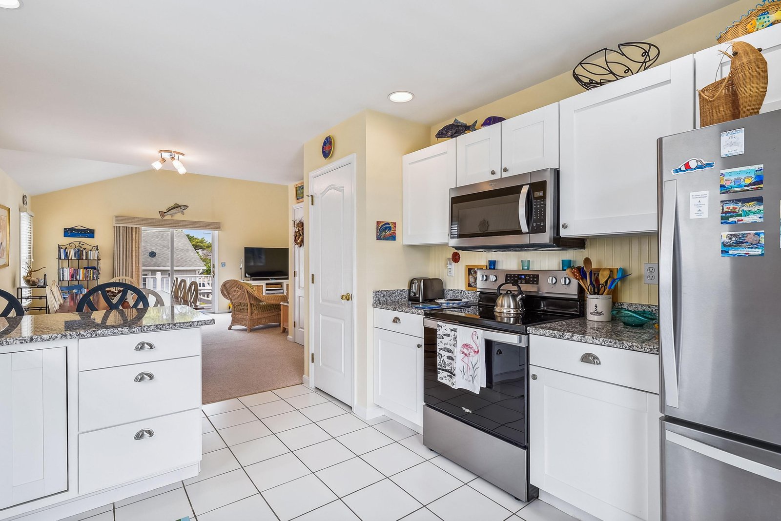 Your fully equipped kitchen makes vacation dining a breeze—whip up fresh meals with granite counters, stainless appliances, and all the coastal charm you need.