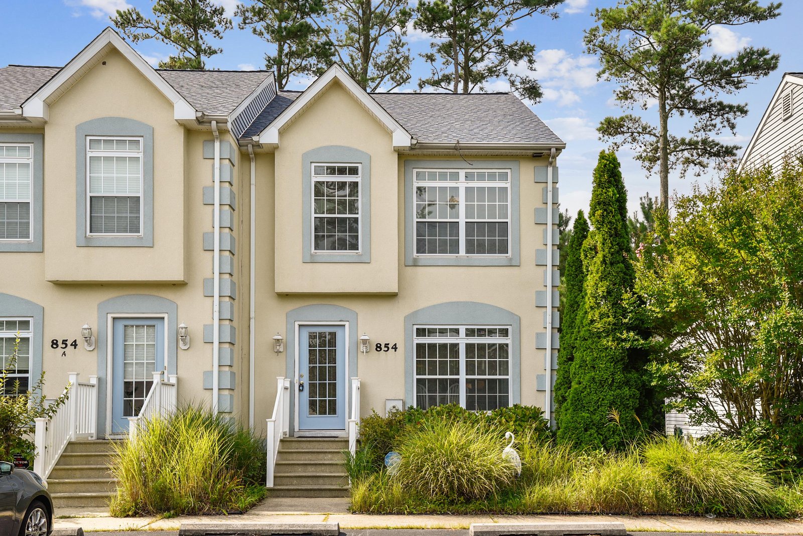 This charming multi-unit property sits nestled among mature trees and lush greenery, offering a peaceful retreat in a quiet residential neighborhood. Each unit features its own private entrance, inviting you into a comfortable home away from home.