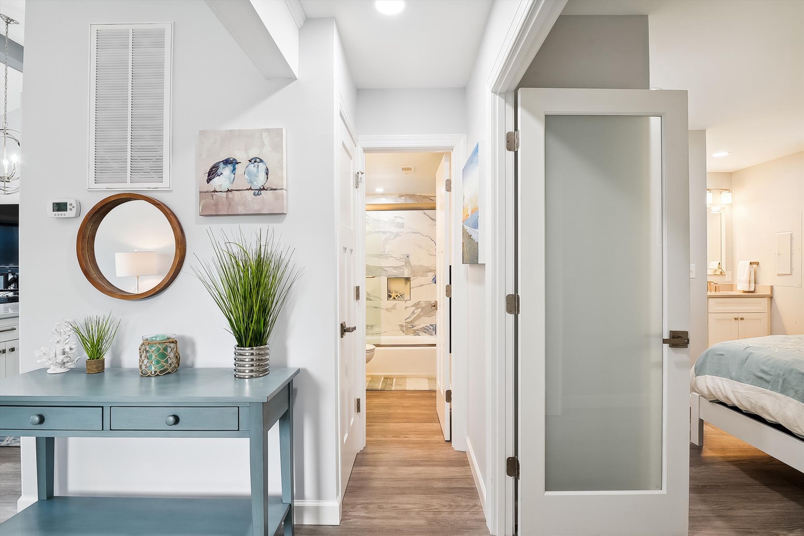 Step into this bright, thoughtfully designed space where coastal charm meets modern comfort through stylish décor and seamless room flow.