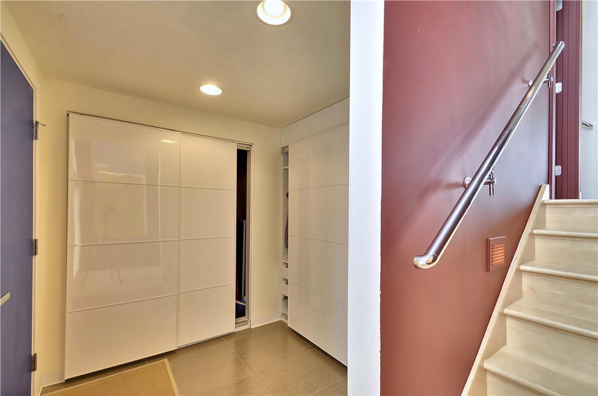 Step into your private retreat through sleek modern entryways, complete with thoughtful accessibility features to ensure everyone feels at home.