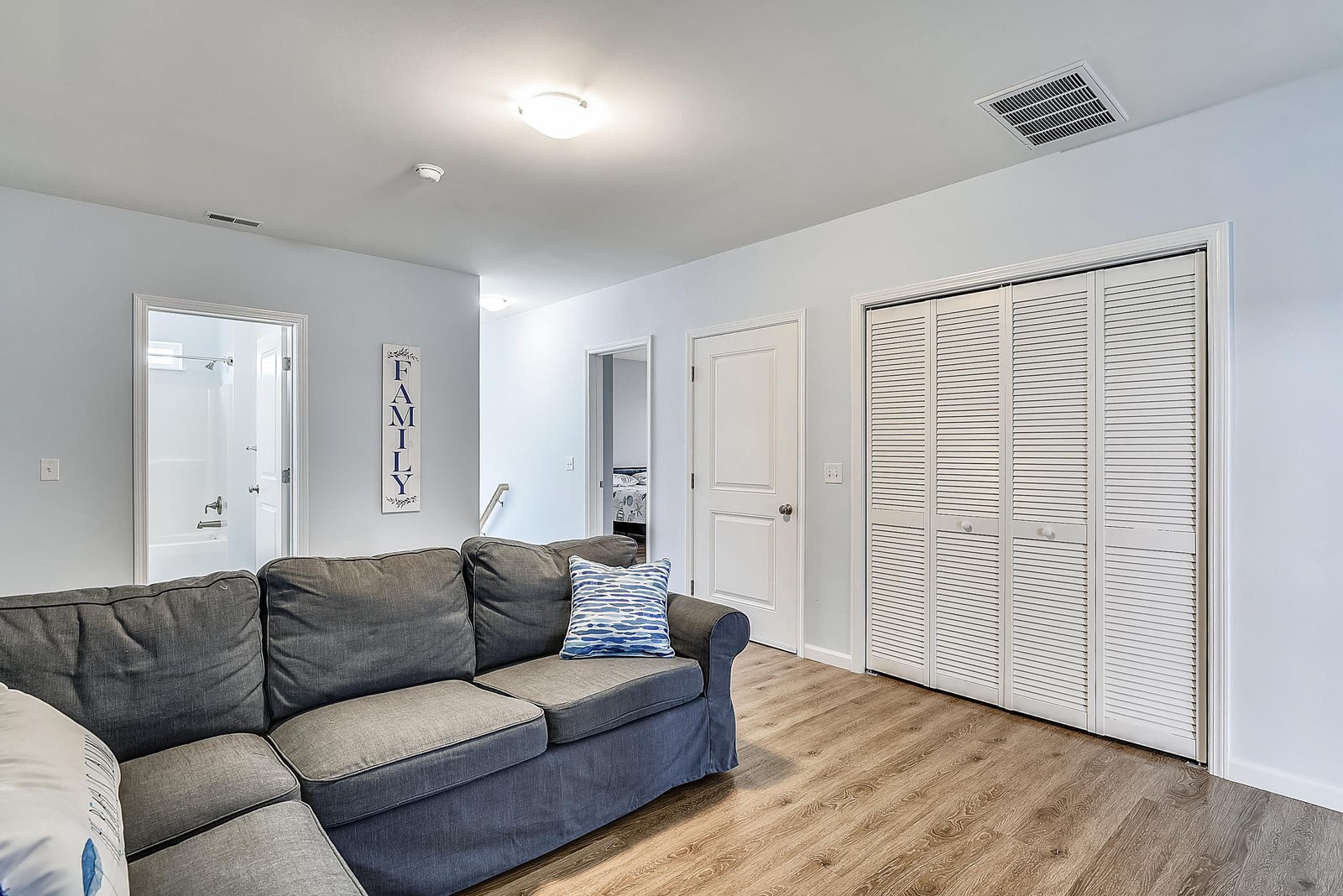 Settle into your comfortable living space with plenty of storage and a cozy sectional perfect for relaxing after a day of exploring.