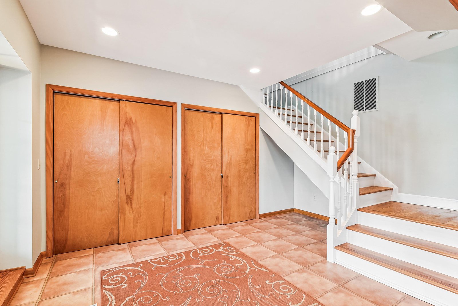 Step into your welcoming entry, where warm wood accents and ample storage set the tone for your entire stay.