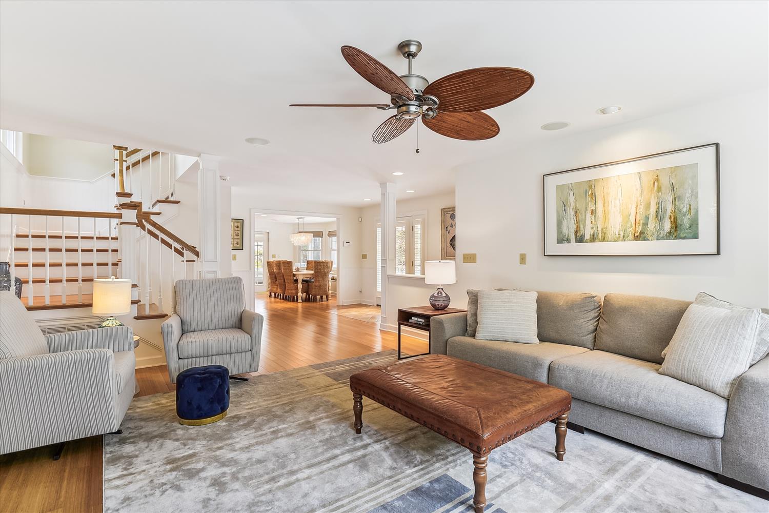 Bright, spacious living room welcomes you with coastal-inspired decor and an open flow that invites easy gathering and relaxation.