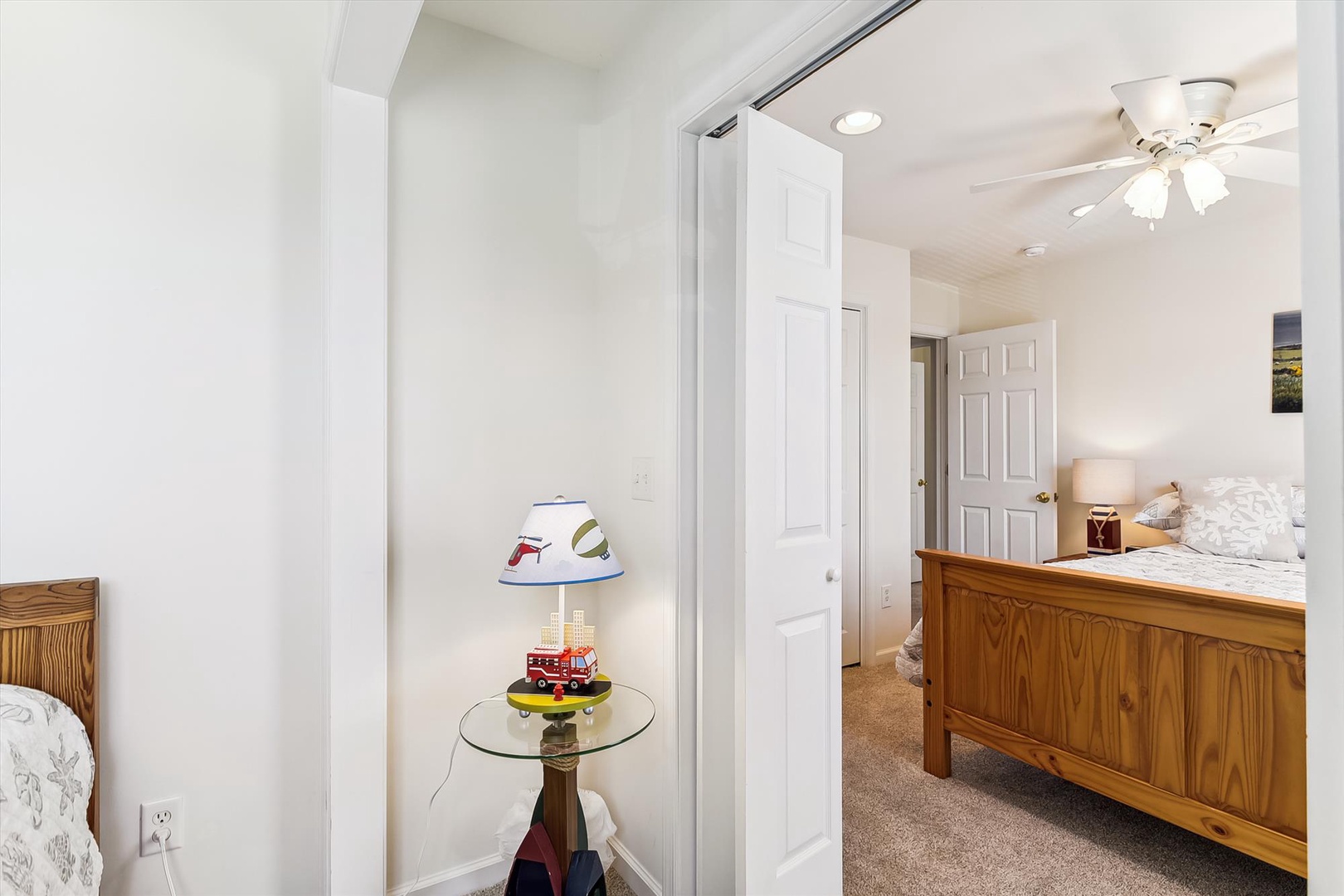 Step into your peaceful bedroom retreat with classic wood furnishings, soft carpeting, and thoughtful touches that make you feel right at home during your stay.