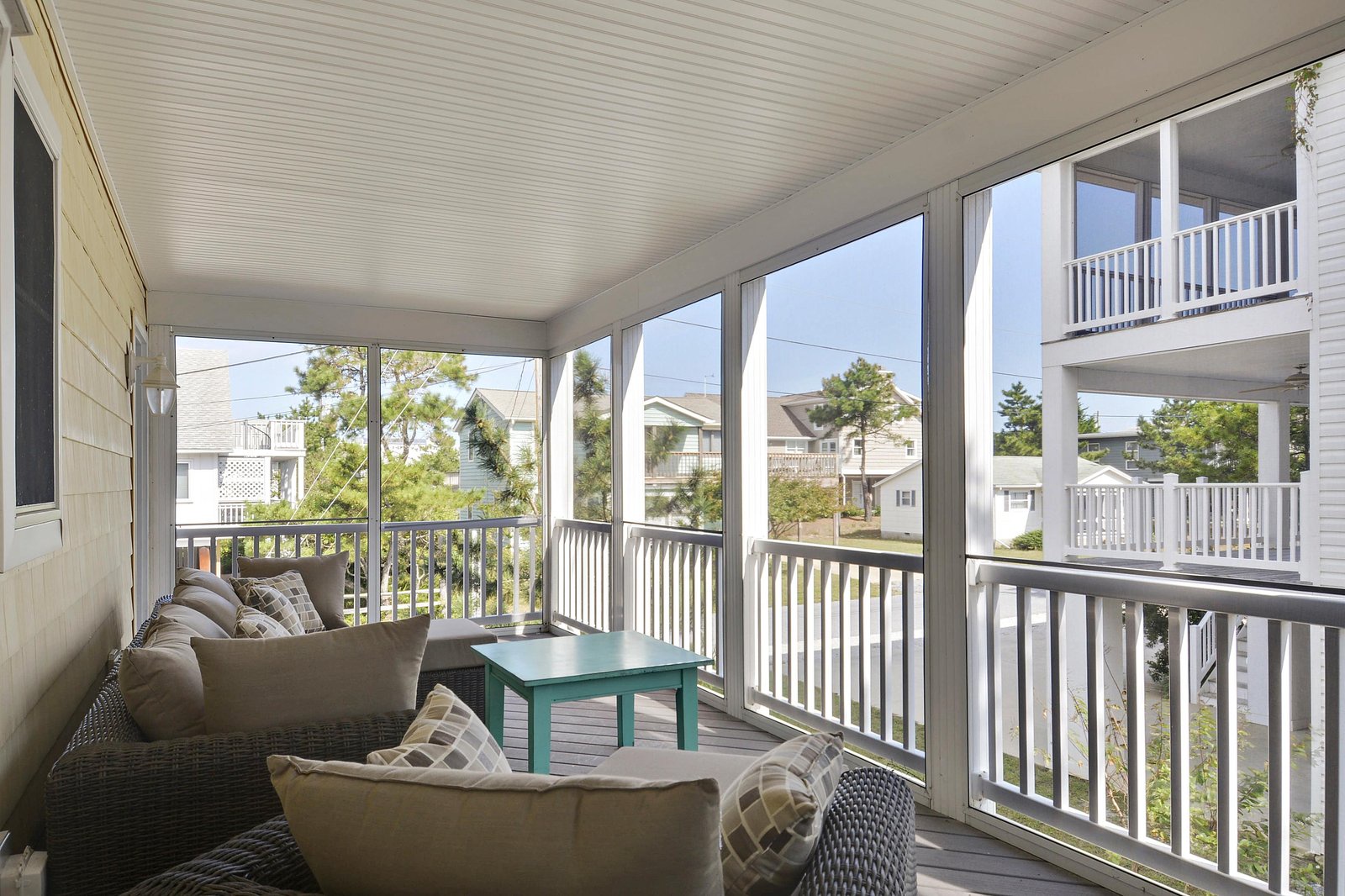 Settle into your screened porch with morning coffee or an evening book, wrapped in gentle coastal breezes and peaceful neighborhood views.