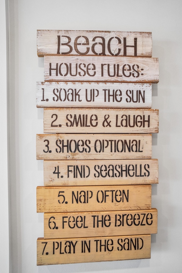 Beach vibes meet playful charm with this welcoming decor that sets the tone for your laid-back coastal getaway.