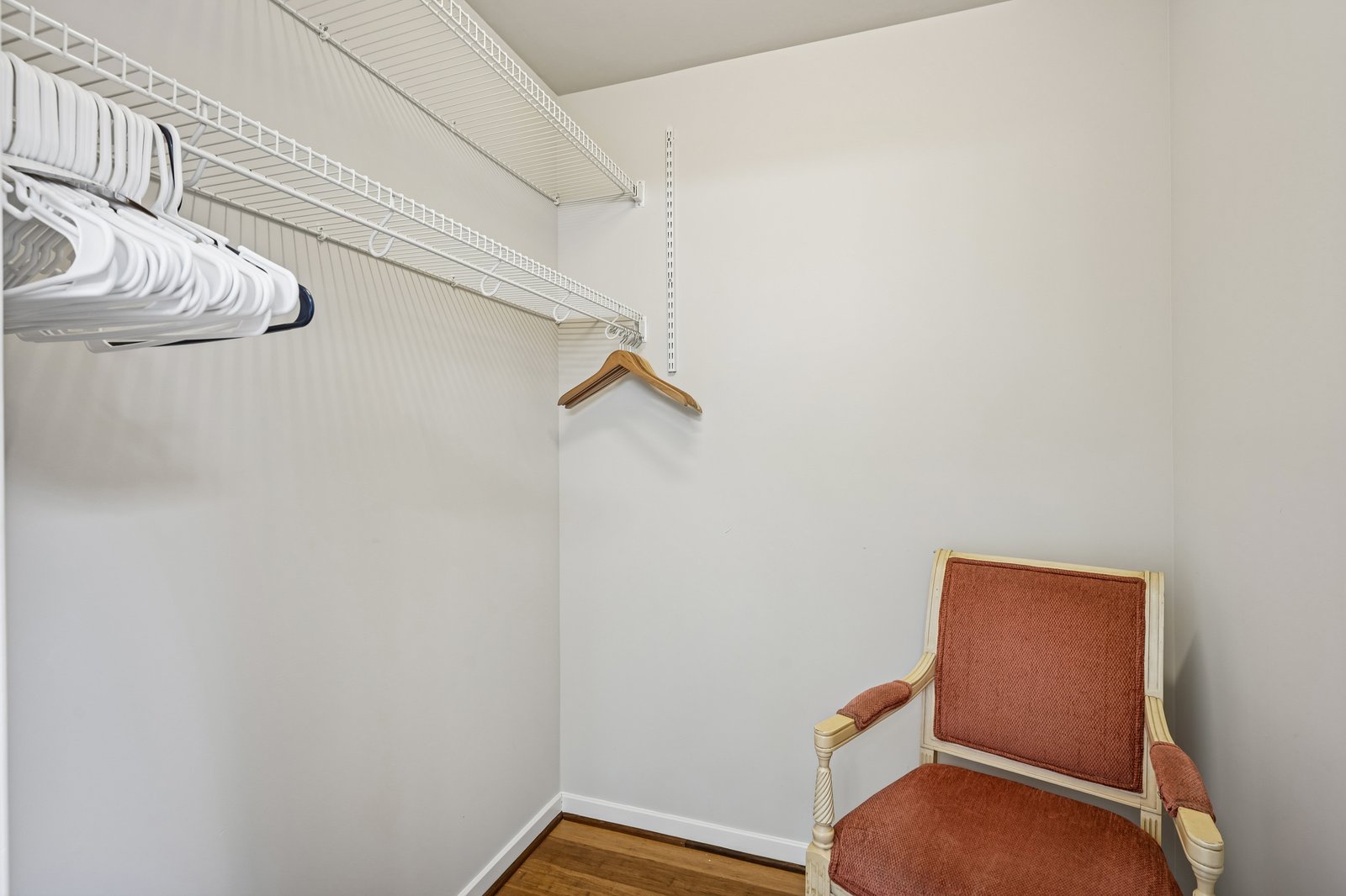 Your spacious walk-in closet features organized wire shelving and plenty of room for all your belongings.