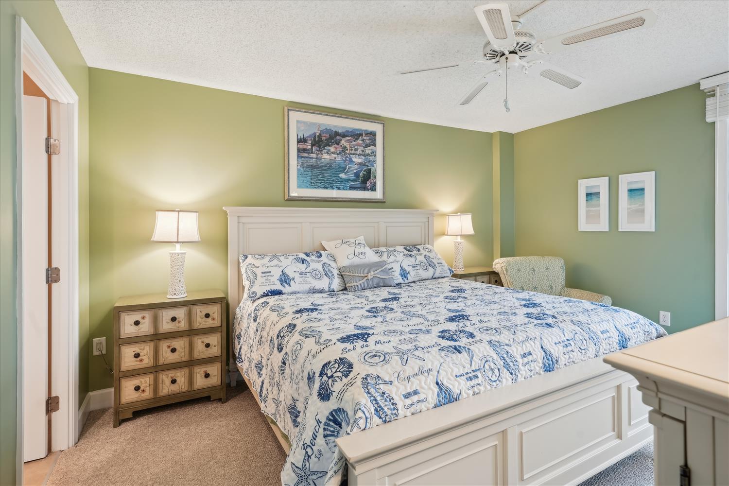 Your peaceful bedroom retreat features coastal charm with soothing sea-inspired colors, elegant furnishings, and soft lighting that creates the perfect atmosphere for restful nights.
