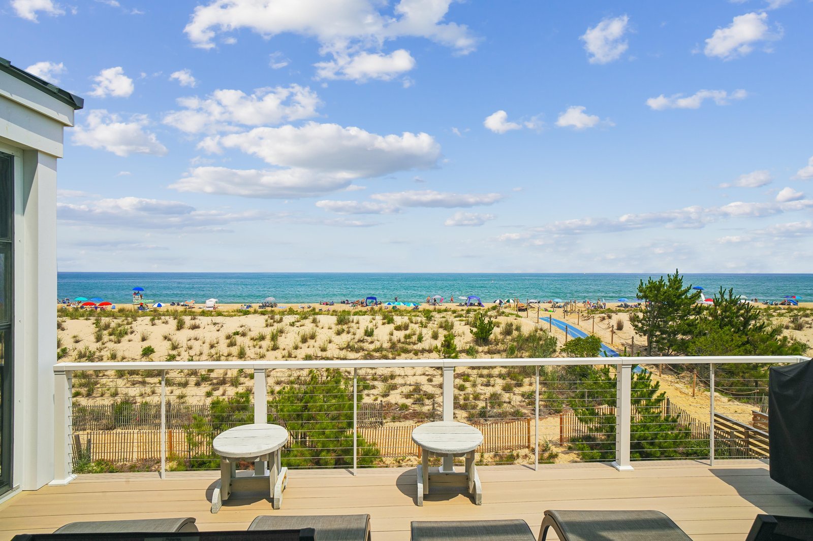 Soak in sweeping ocean views from your private deck, just steps from the beach. Watch waves roll in while you relax in the sea breeze.