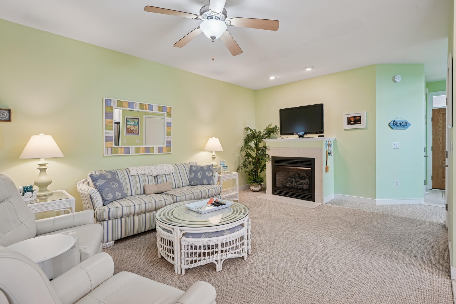 Curl up on the cozy sofa, catch your favorite show, and enjoy the warmth of your own fireplace as the ceiling fan keeps you perfectly comfortable year-round.