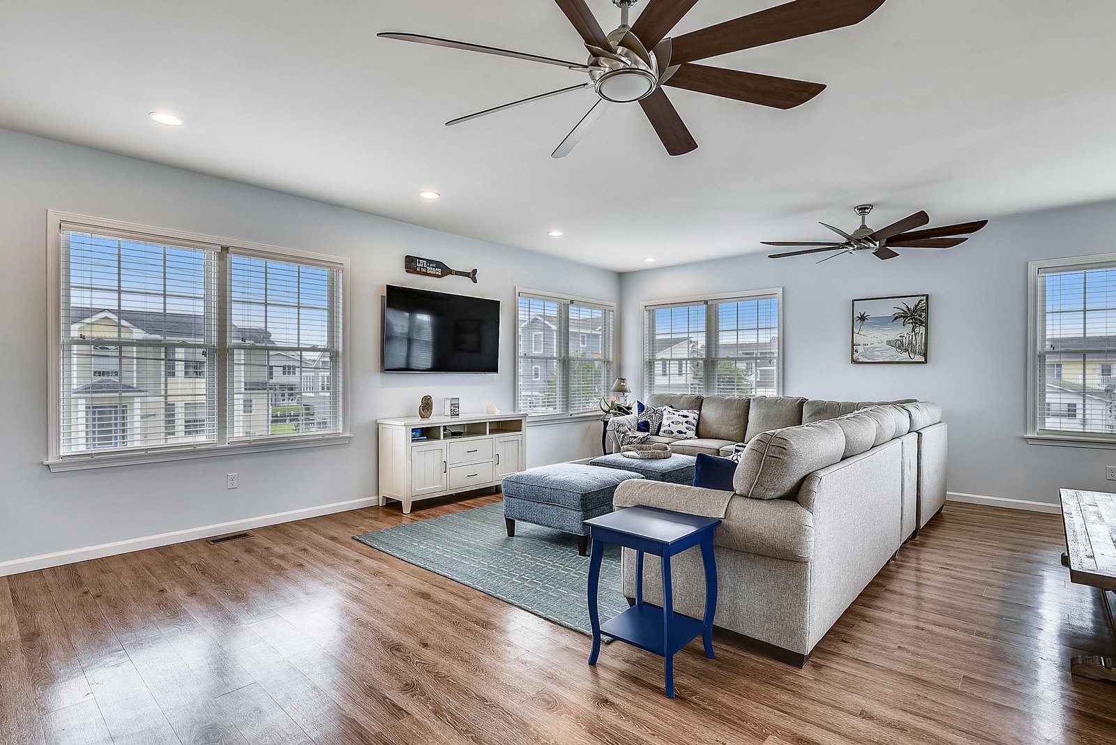 Stretch out in your bright, airy living room with vaulted ceilings, plush seating, and coastal charm. Natural light fills the space, inviting relaxation after a day of adventure.