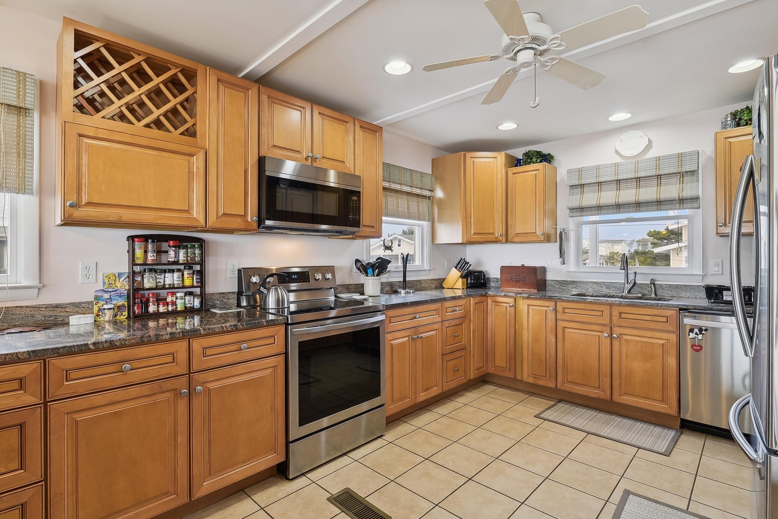 Your spacious kitchen comes fully equipped with stainless steel appliances, granite countertops, and all the tools you need to prepare memorable meals during your stay.