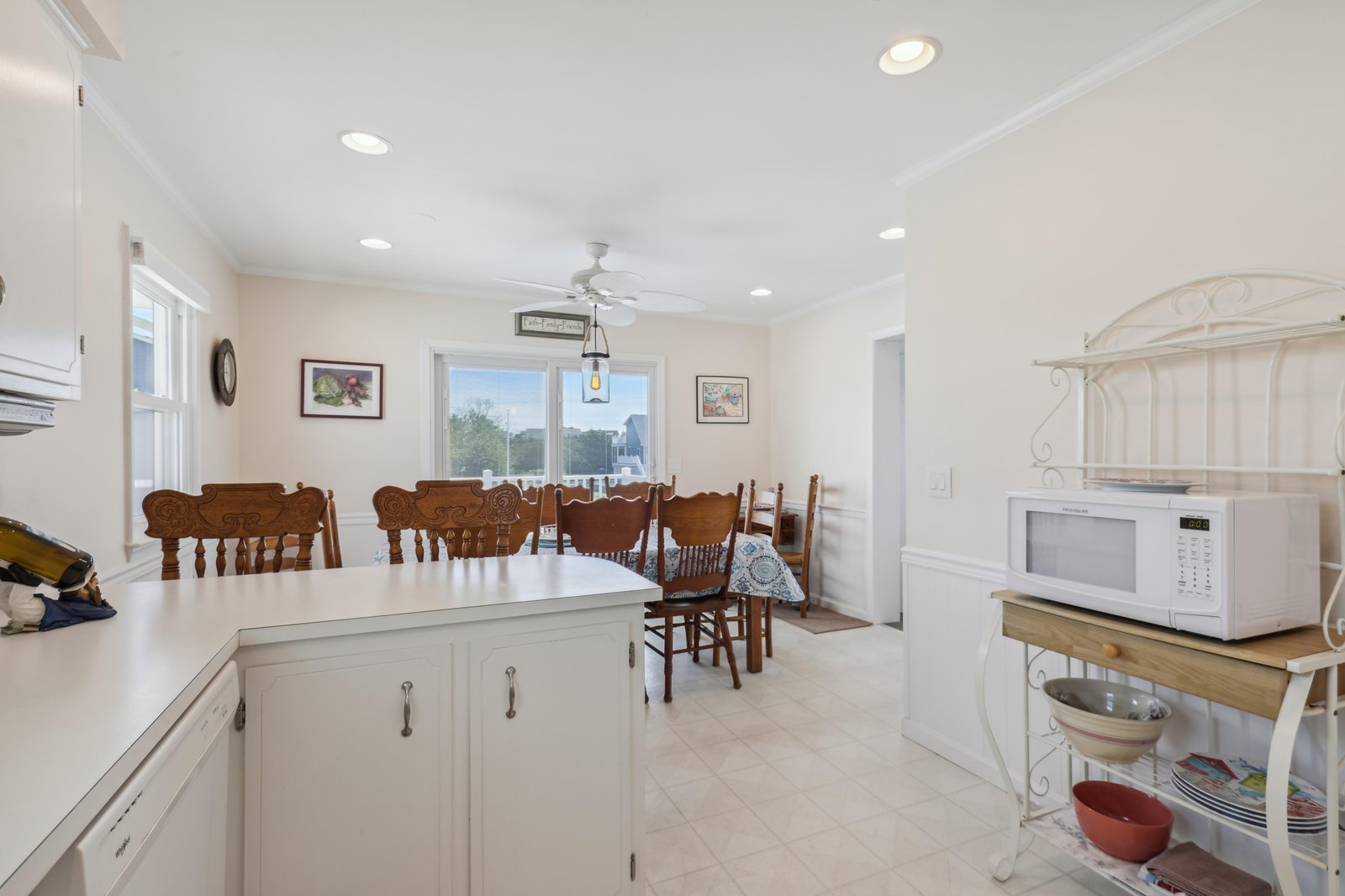 Bright, airy eat-in kitchen with room for everyone. Gather at the big farmhouse table for meals, share stories over coffee, and feel right at home.