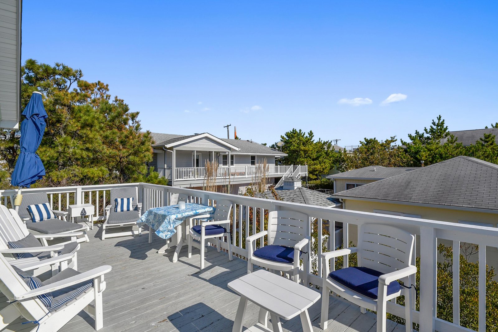 Gather on your private deck under sunny skies, where crisp air and coastal views create the perfect setting for morning coffee or evening conversations.
