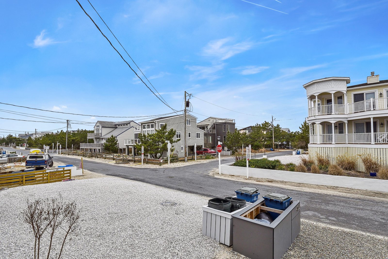 A peaceful coastal neighborhood with well-maintained vacation homes, wide streets, and easy access to nearby beaches and attractions.