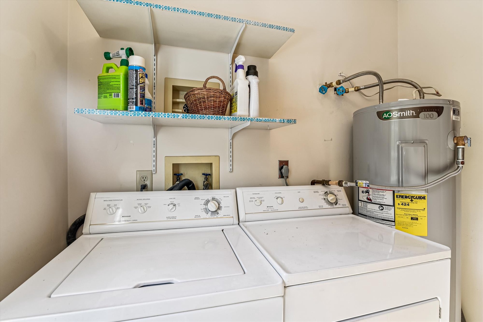 Your dedicated laundry room keeps your vacation wardrobe fresh with full-size washer, dryer, and organized storage space.