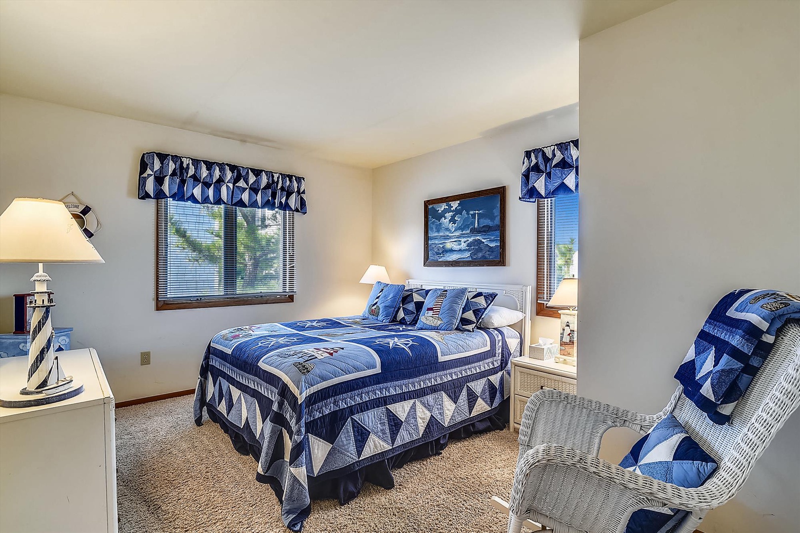 Drift off in your coastal-inspired bedroom with fresh sea breezes, nautical charm, and a plush bed dressed in crisp blues and whites just for you.