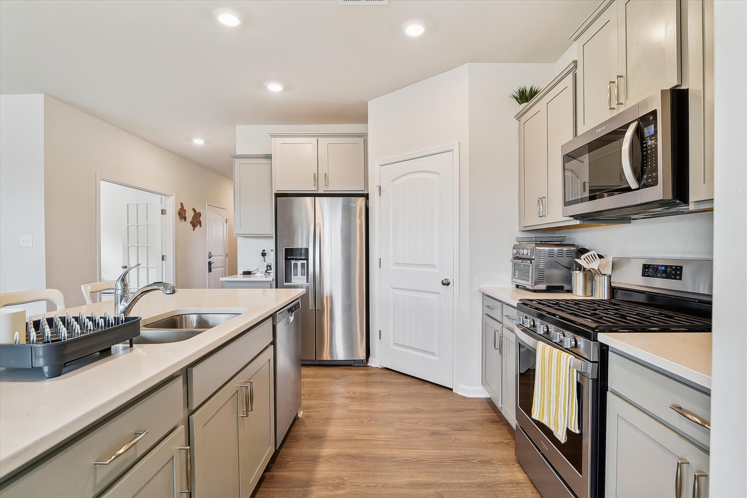 Your fully equipped kitchen awaits with modern stainless steel appliances, granite countertops, and everything you need to create memorable meals.