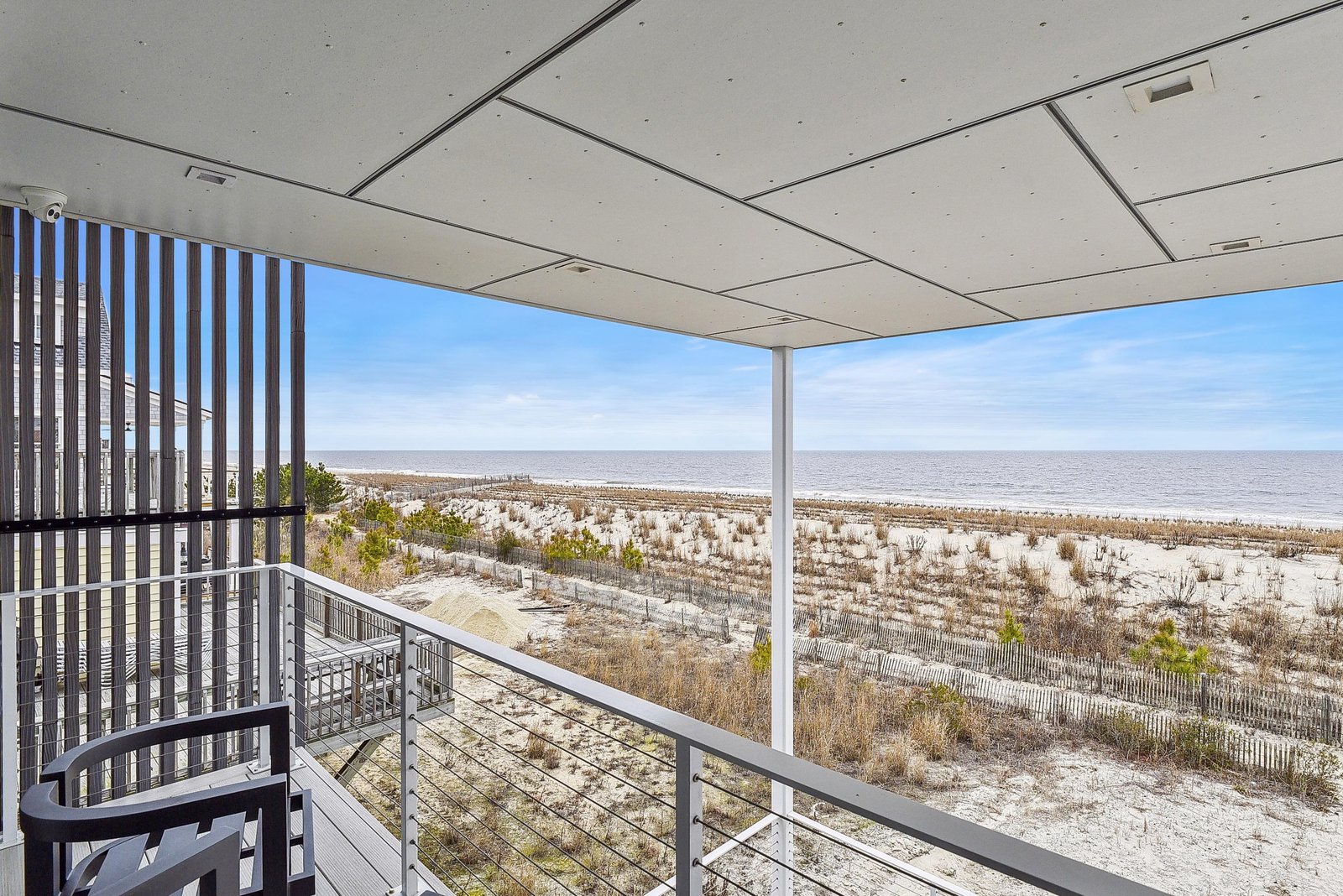 Step onto your private balcony and let the ocean breeze wash over you as you take in sweeping views of the beach and sea. This is your front-row seat to coastal serenity.