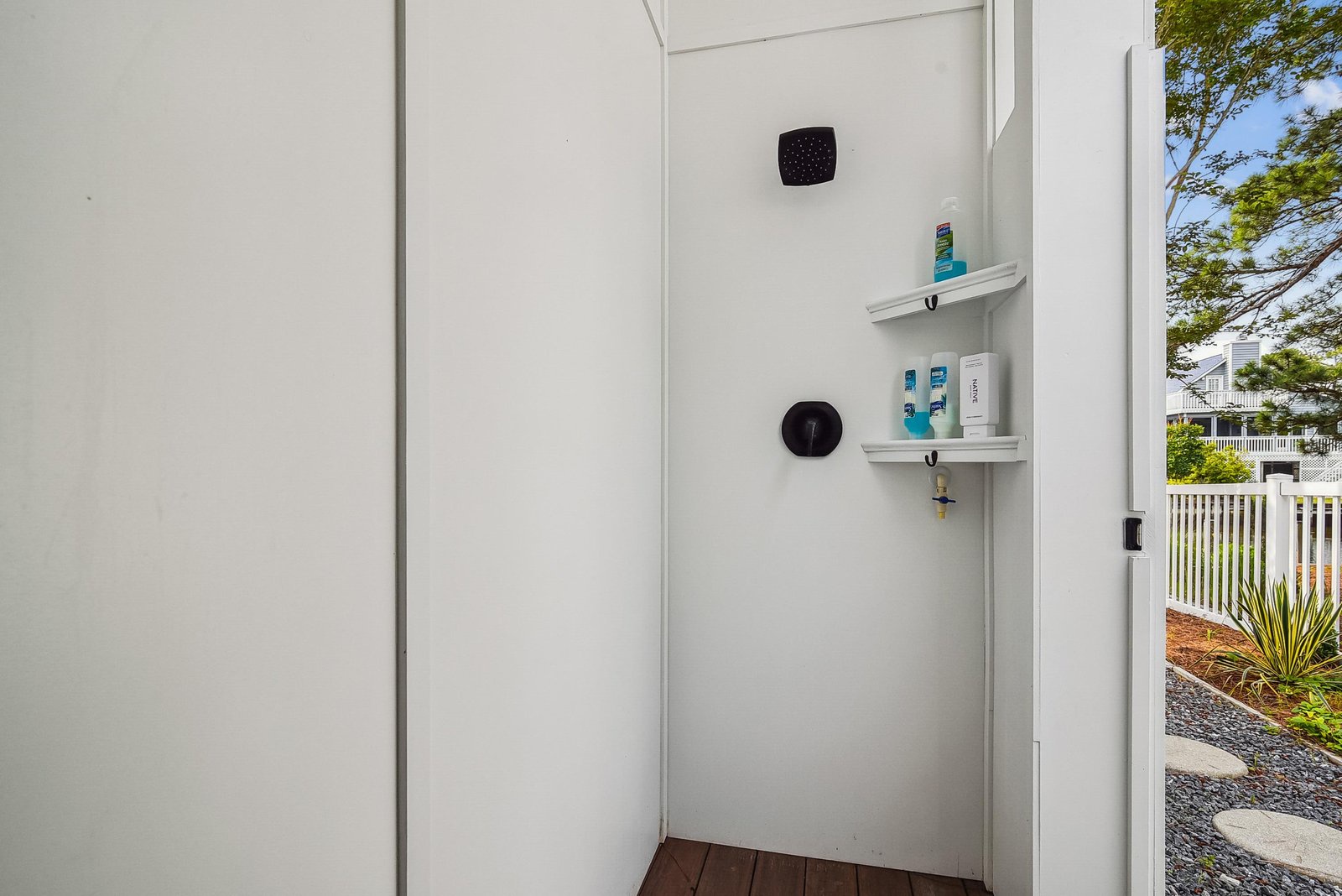 Rinse off under your private outdoor shower, stocked with fresh toiletries and just steps from the sunny coastal surroundings.