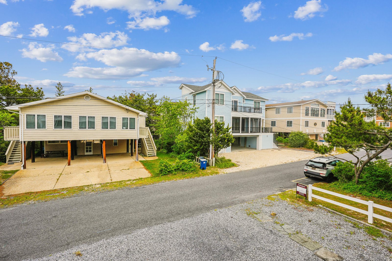 The property sits in a quiet coastal neighborhood with convenient parking and easy access to nearby beach areas and local attractions.