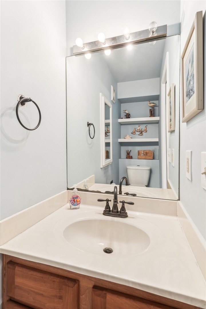 Your private bathroom features soft lighting, thoughtful storage, and everything you need to start your day refreshed and ready for adventure.