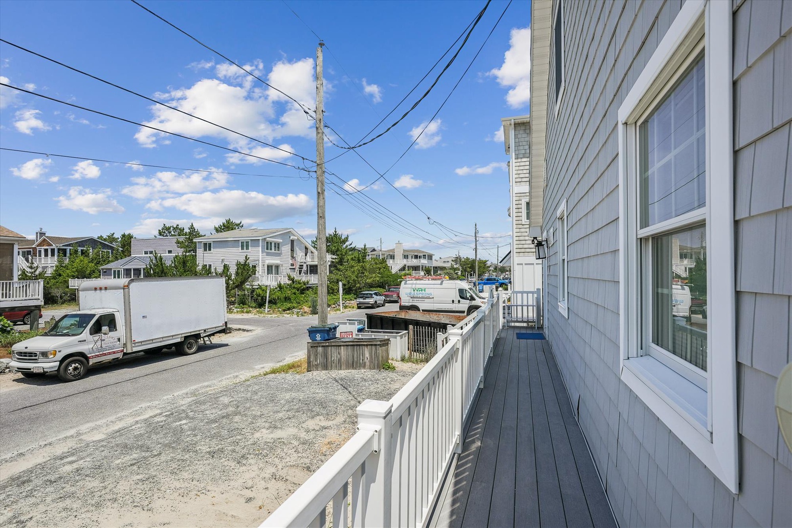 Charming coastal neighborhood setting with residential streets and nearby beach community just steps away from your vacation retreat.