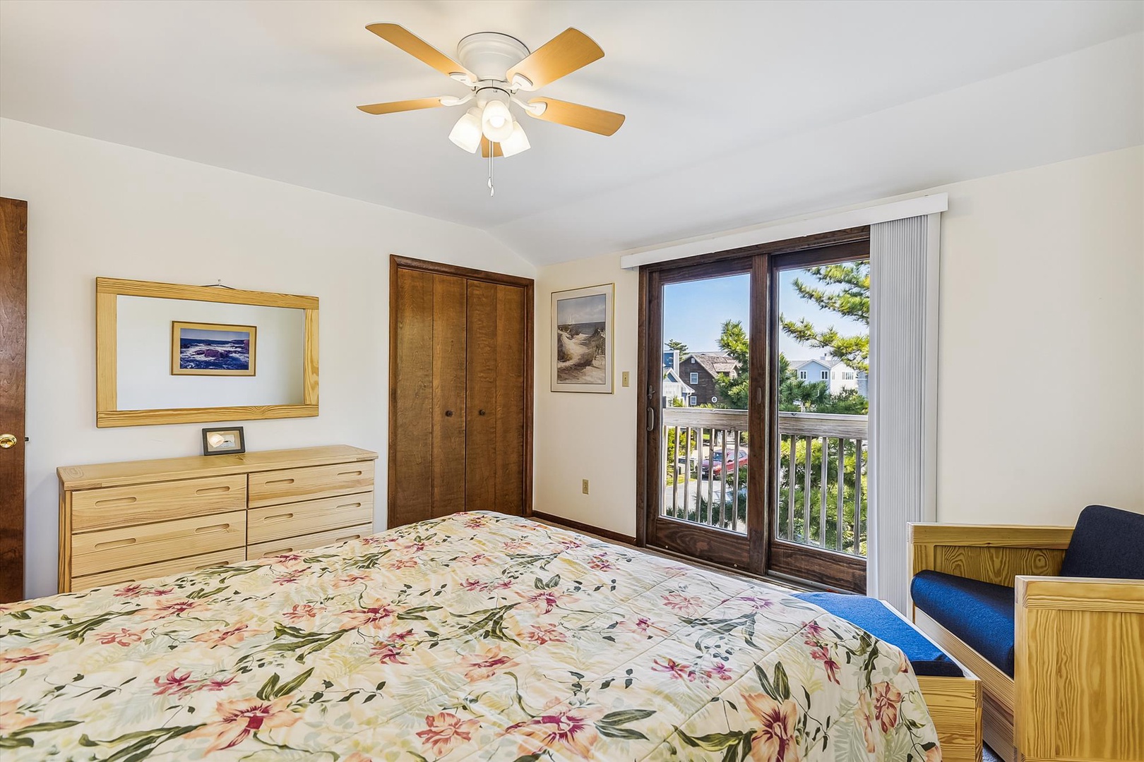 Relax in comfort with a ceiling fan overhead, dresser for your belongings, and a private balcony to enjoy nearby neighborhood views.