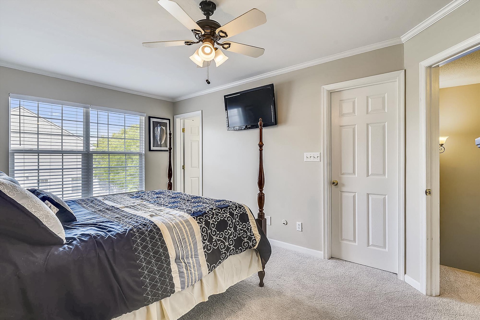 Sink into this plush bed after your adventures, with soft linens, a ceiling fan for comfort, and your own TV for winding down in quiet relaxation.
